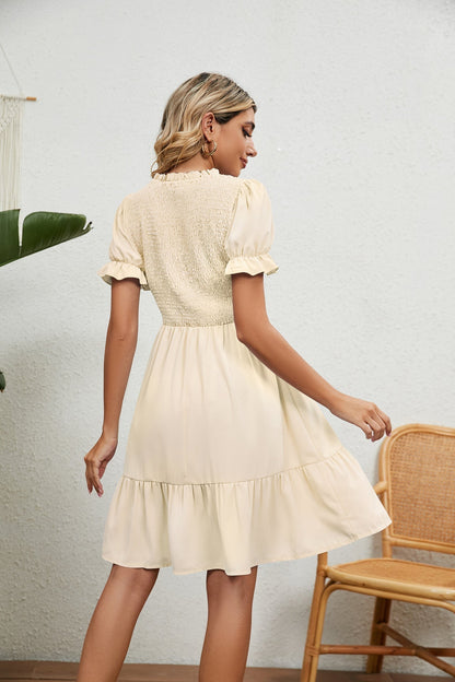 Beige zomerjurk met franjes