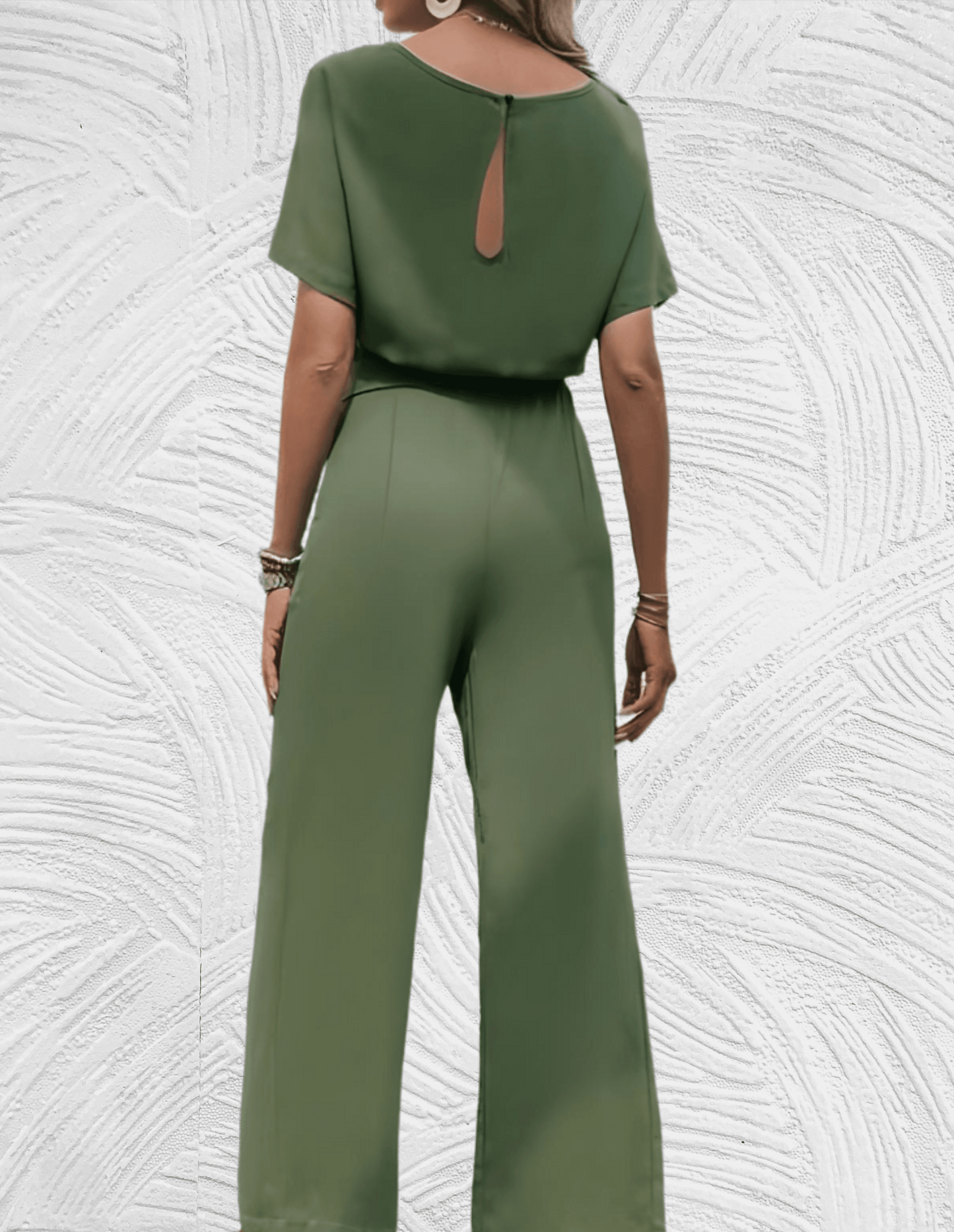Velanora-  Mooi aansluitende jumpsuit met wijde mouwen en wijde pijpen met strikbandjes aan de zijkant