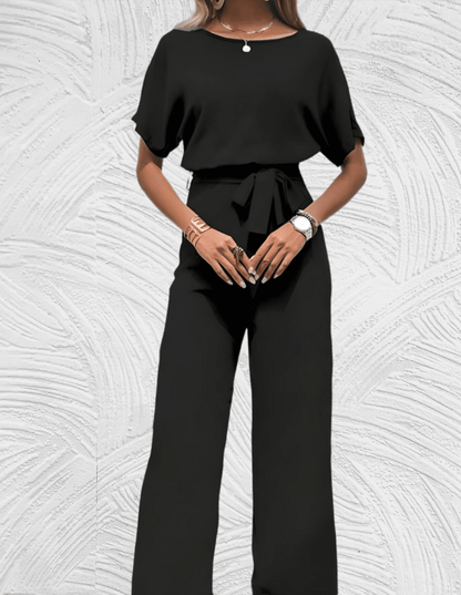 Velanora-  Mooi aansluitende jumpsuit met wijde mouwen en wijde pijpen met strikbandjes aan de zijkant