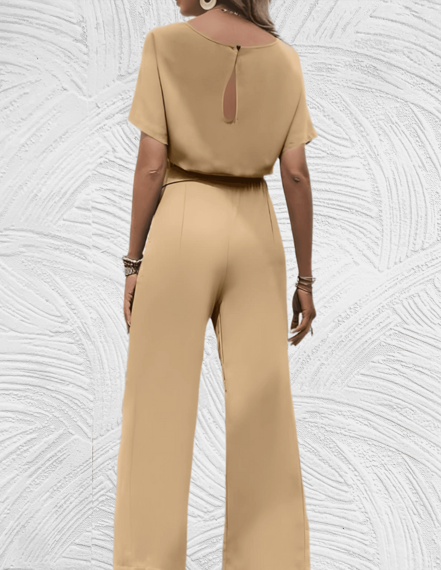 Velanora-  Mooi aansluitende jumpsuit met wijde mouwen en wijde pijpen met strikbandjes aan de zijkant