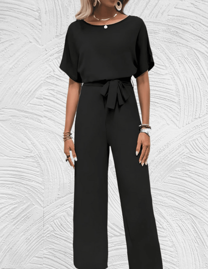 Velanora-  Mooi aansluitende jumpsuit met wijde mouwen en wijde pijpen met strikbandjes aan de zijkant