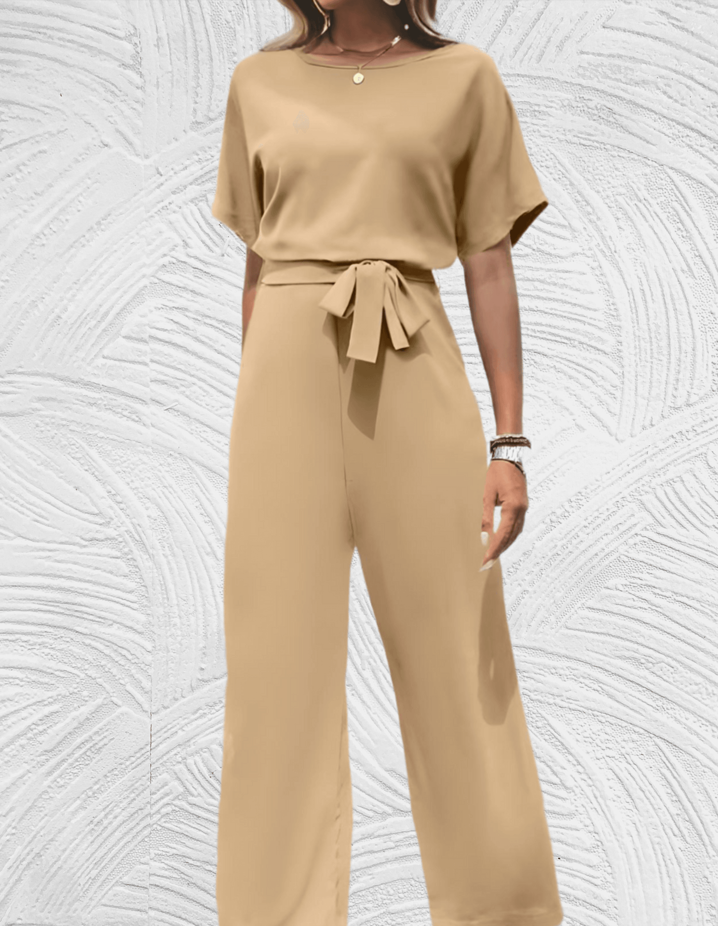 Velanora-  Mooi aansluitende jumpsuit met wijde mouwen en wijde pijpen met strikbandjes aan de zijkant