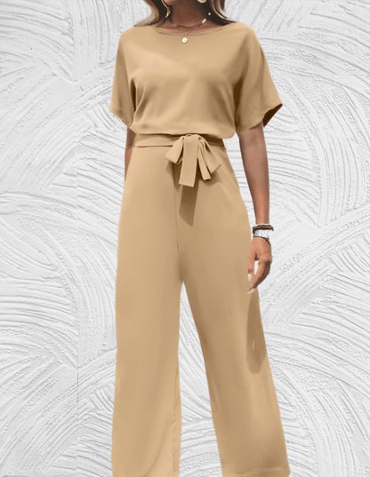 Velanora-  Mooi aansluitende jumpsuit met wijde mouwen en wijde pijpen met strikbandjes aan de zijkant