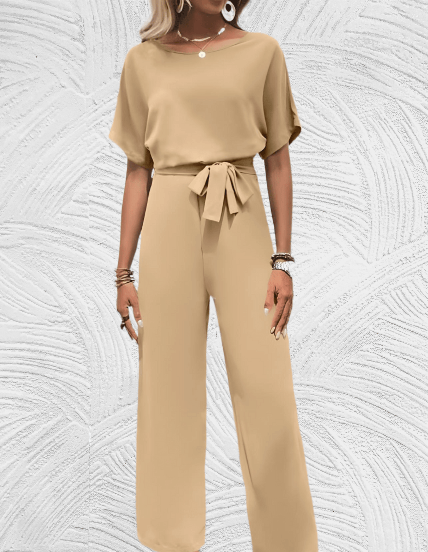 Velanora-  Mooi aansluitende jumpsuit met wijde mouwen en wijde pijpen met strikbandjes aan de zijkant