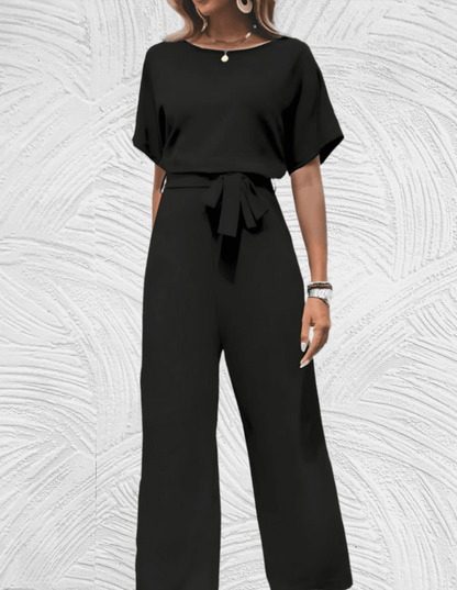 Velanora-  Mooi aansluitende jumpsuit met wijde mouwen en wijde pijpen met strikbandjes aan de zijkant