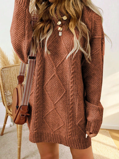 Trui jurk met kabelpatroon en ribbelafwerking