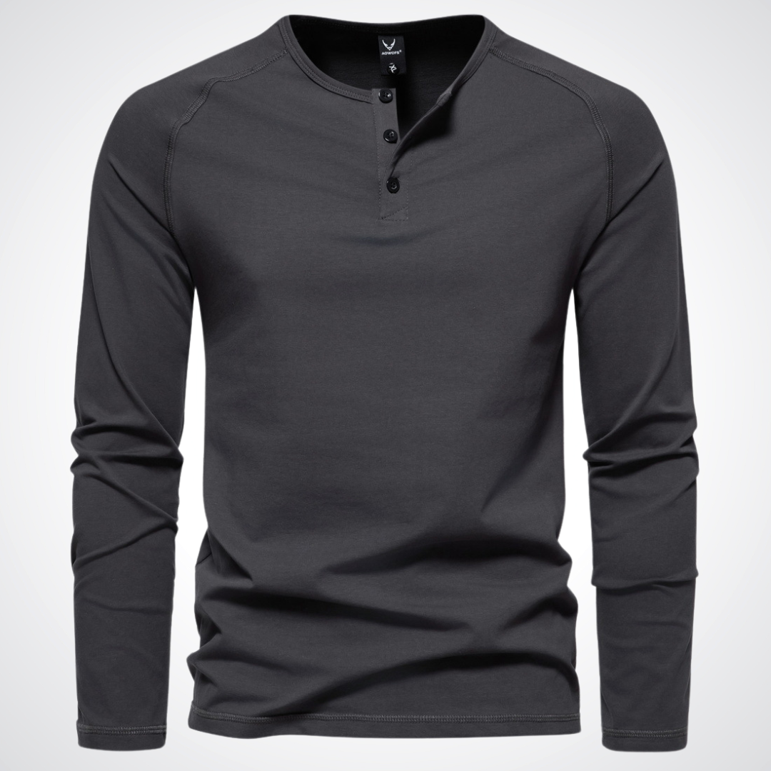 Unero comfortabel hemd met lange mouwen in donkergrijs. Het hemd heeft een klassieke knoopsluiting bij de hals en een minimalistisch design, perfect voor zowel casual als semi-formele gelegenheden.