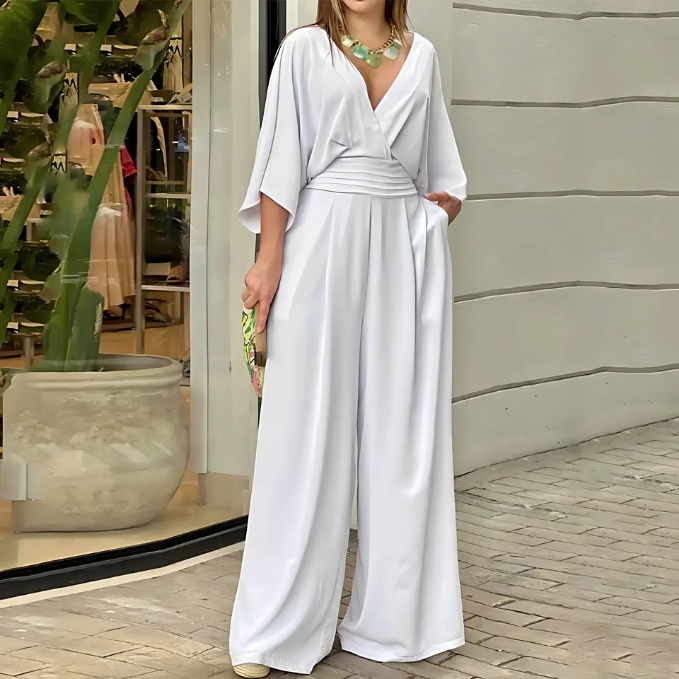 Elegante Jumpsuit met Wijde Pijpen en Vleermuismouwen - Mode Vibes