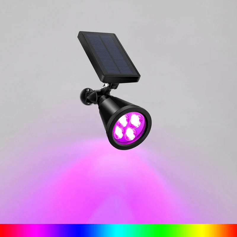 Een energiezuinige tuinlamp met een zwart zonnepaneel en vier paarse LED-lampen. De lamp schijnt een heldere paarse gloed uit en is ontworpen om buitenruimtes duurzaam te verlichten met zonne-energie. De lamp biedt veelzijdige kleurkeuzes voor sfeervolle verlichting.