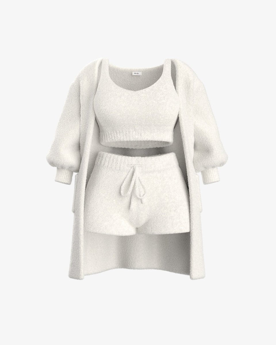 Witte fleece set met een zachte top, trui en korte broek voor ultiem comfort en warmte.