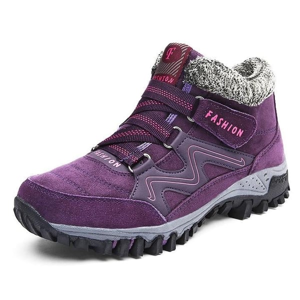 Paar paarse winterschoenen van Zaffaro met een warme voering en stevige antislipzolen. Deze modieuze schoenen bieden comfort en bescherming tegen de kou, perfect voor de wintermaanden.