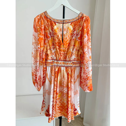 ModeMysterie Diepe V Vakantie Diner Zomerjurk met Oranje Print