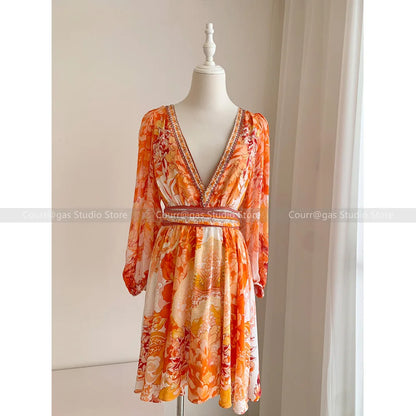 ModeMysterie Diepe V Vakantie Diner Zomerjurk met Oranje Print