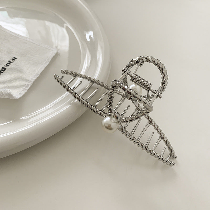 Dames Haarclip met Parel en Gedraaid Metaal Design