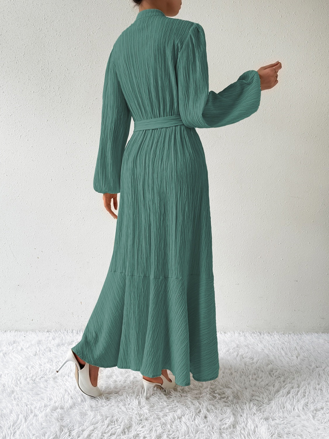 Vrouwelijke Jurk met Lange Mouwen en Taille Accent