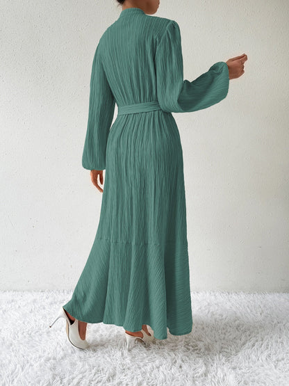 Vrouwelijke Jurk met Lange Mouwen en Taille Accent