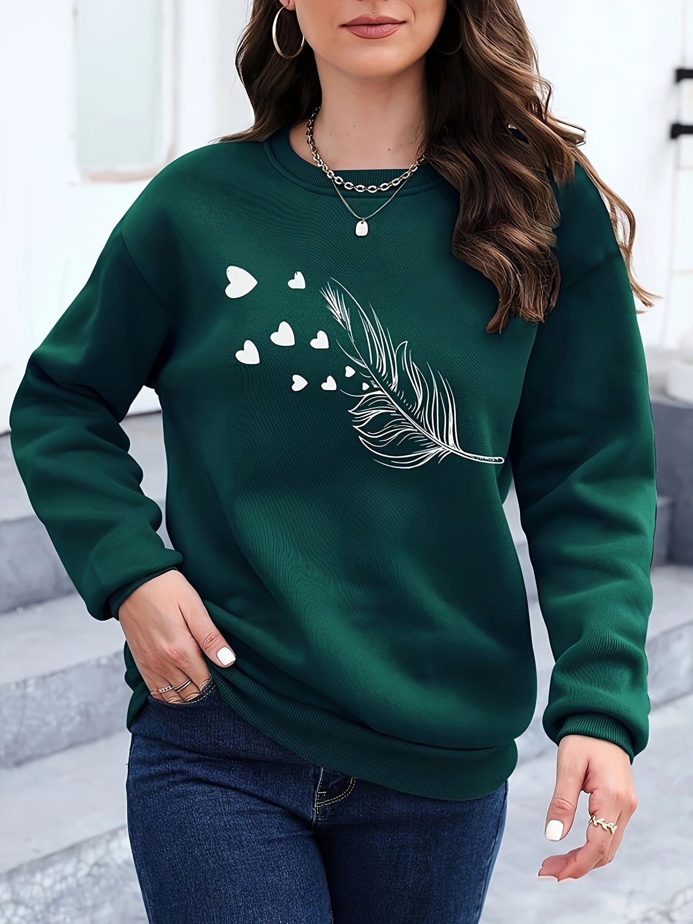Vrouwelijk Sweatshirt met Verenprint Marisa Casual Stijl - Mode Vibes