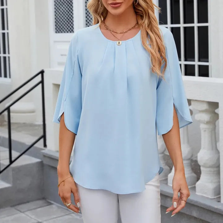 Lena | Blusa unica con pieghe e maniche a sbuffo