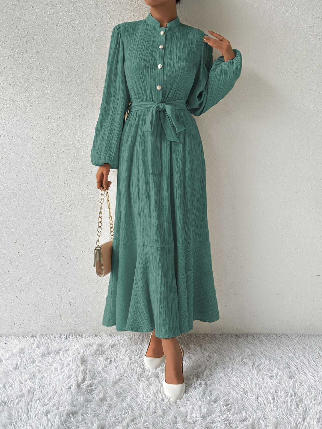 Vrouwelijke Jurk met Lange Mouwen en Taille Accent