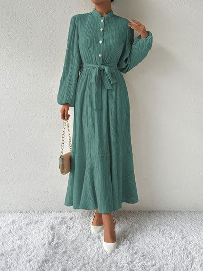 Vrouwelijke Jurk met Lange Mouwen en Taille Accent