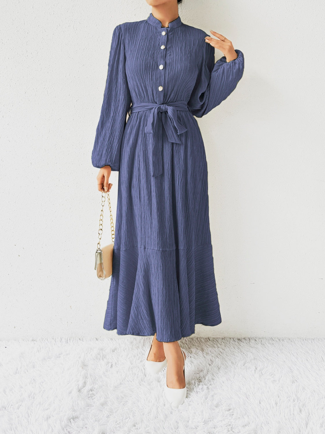 Vrouwelijke Jurk met Lange Mouwen en Taille Accent