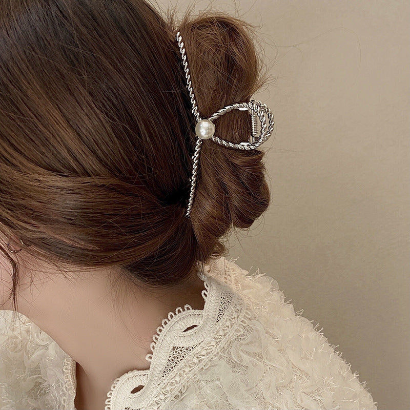 Dames Haarclip met Parel en Gedraaid Metaal Design