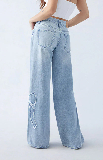 Vrouwelijke Jeans met Strik Detail