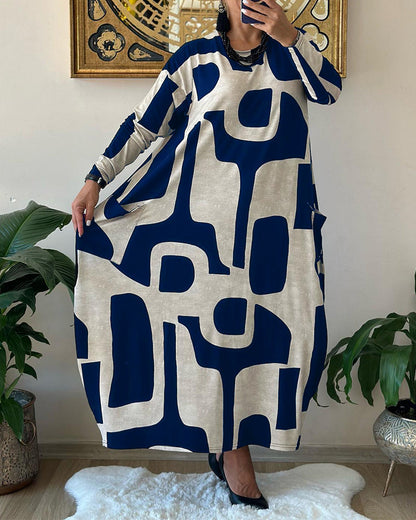 Jurk met lange mouwen en zwart witte print in de kleur Zwart voor dames in stijl ideaal voor de herfst.