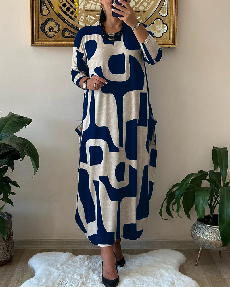 Jurk met lange mouwen en zwart witte print in de kleur Zwart voor dames in stijl ideaal voor de herfst.