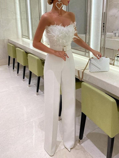 Luxe Jumpsuit met Veren Accent en Lange Mouwen