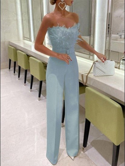 Luxe Jumpsuit met Veren Accent en Lange Mouwen