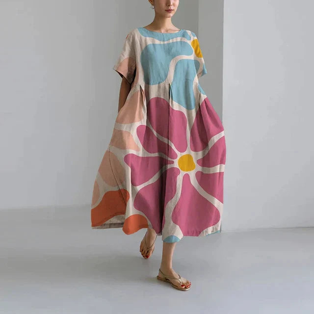 https://cdn.shopify.com/s/files/1/0741/0774/8619/files/robe-longue-boh_me-imprim_-fleurs-rose.webp?v=1726495666