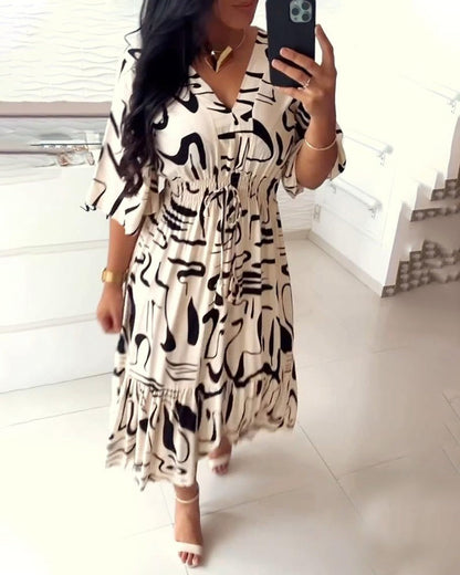 Lindi | Abito con scollo a V